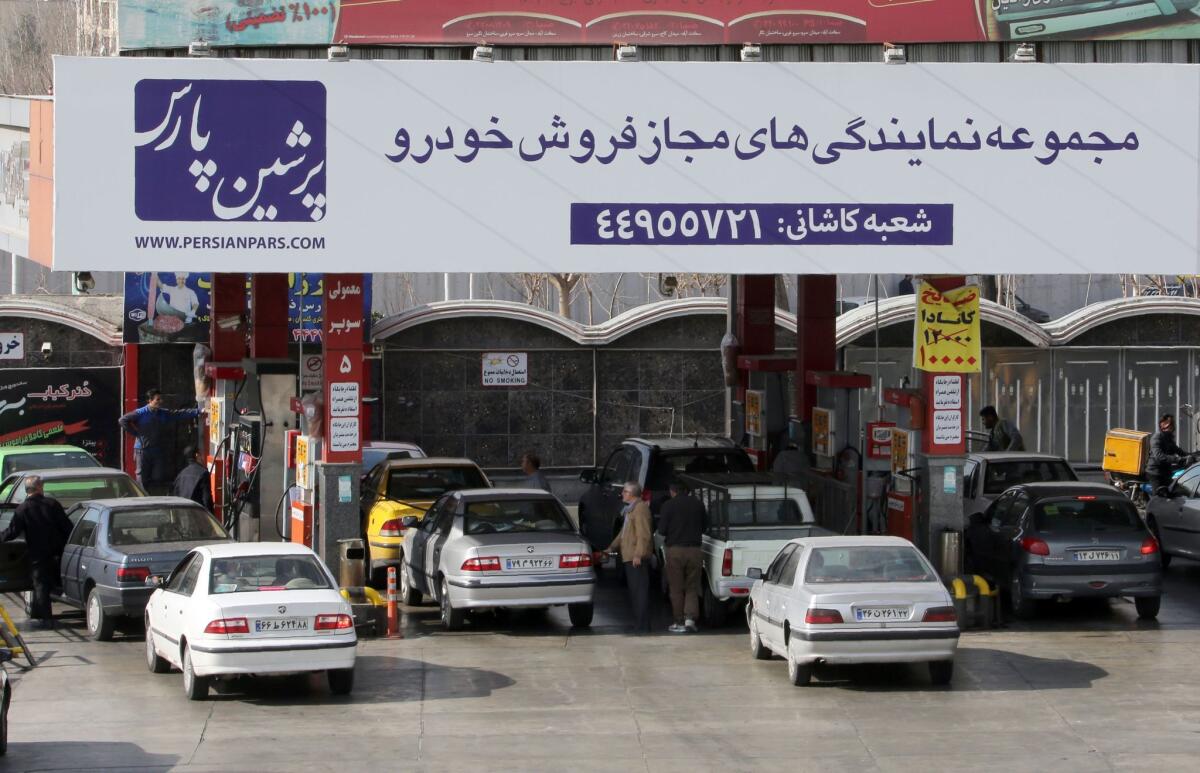 Iranian motorists fill up at a gas station in the capital, Tehran, on Jan. 19, 2016.