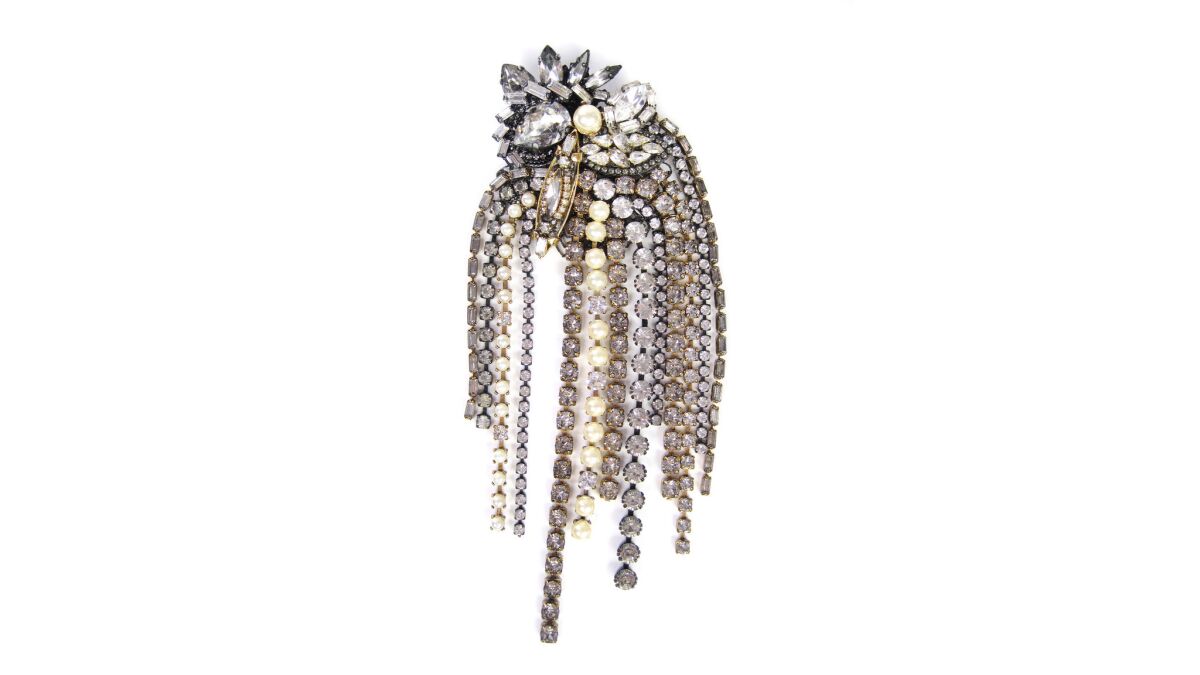 Erickson Beamon brooch with vermeil, Swarovski crystals and Japanese glass pearls, $593 at Laura Gambucci boutique in La Jolla, (858) 551-0214.
