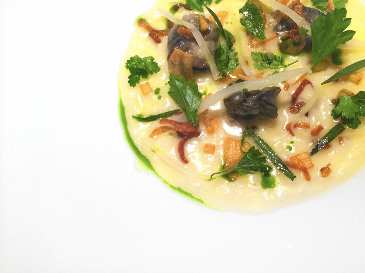 The escargot porridge from Patina chef Paul Lee has rice porridge, Iberico ham and parsley.
