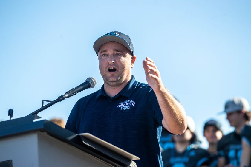 El Cajon, CA - December 16: Granite Hills head football coach Kellan Cobbs addresses the crowd during a celebration of the Eagles' state championship near the school on Friday, Dec. 16, 2022 in El Cajon, CA. Last Saturday, Granite Hills defeated Danville San Ramon Valley in a 31-24 overtime thriller to win the California 2-A state championship. (Meg McLaughlin / The San Diego Union-Tribune)