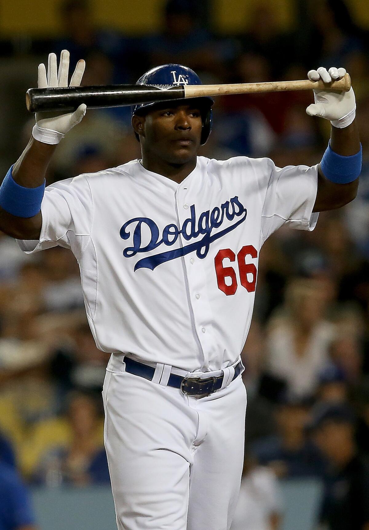 Dodgers General Manager Ned Colletti says rookie outfielder Yasiel Puig has "made a lot of progress" in becoming a more well-rounded player.