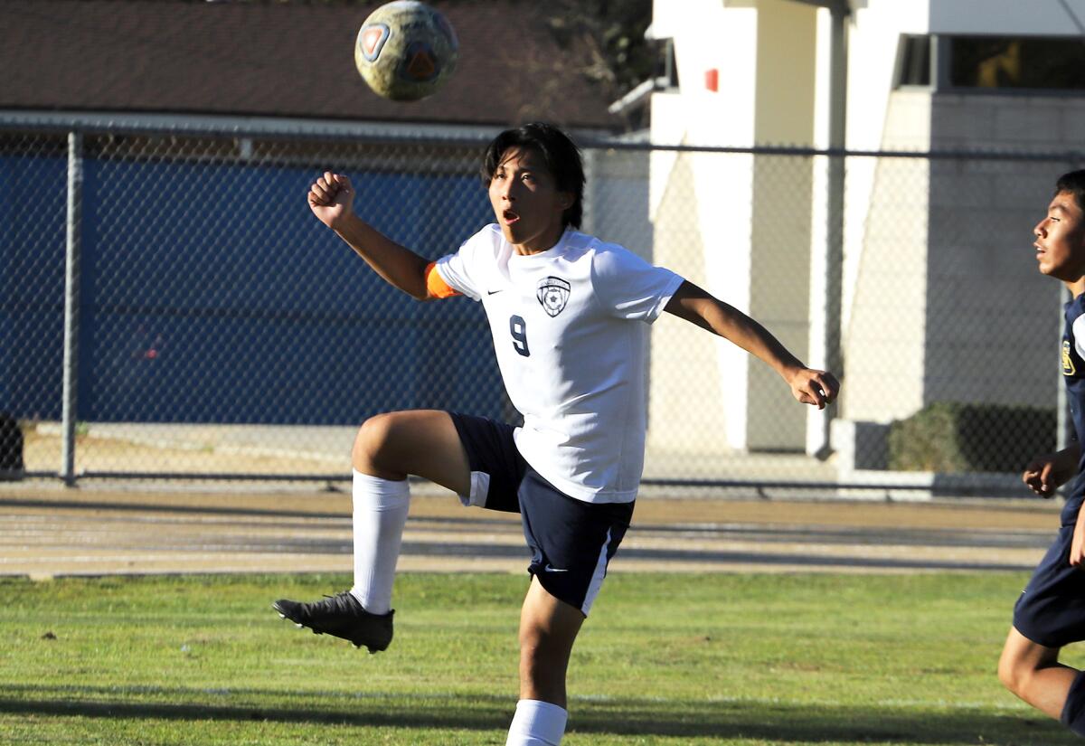 Pacifica Christian's Bryce Wang (9) receives the ball in a CIF Southern Section Division 7 boys' soccer wildcard round game.