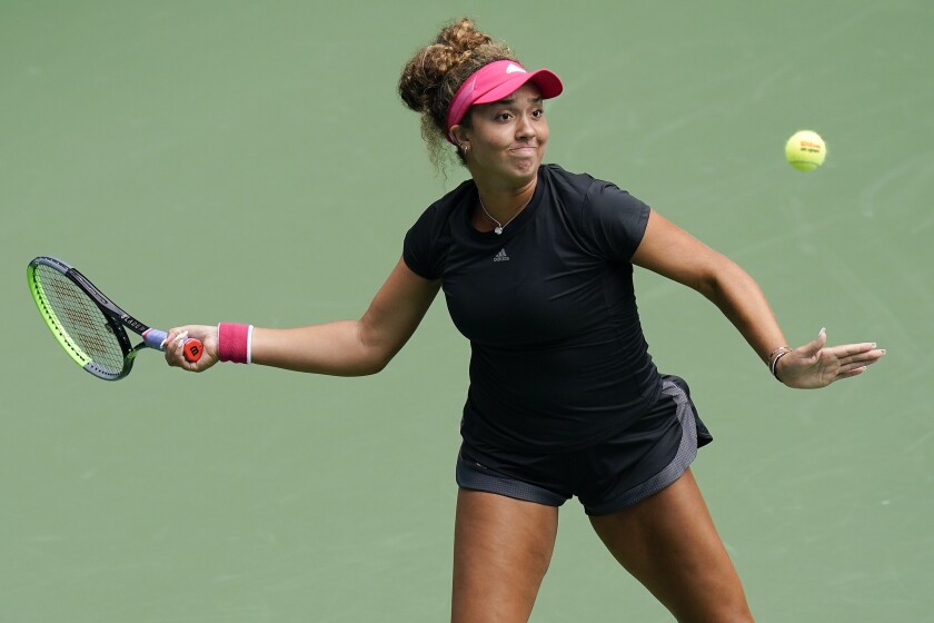 Katrina Scott returns a shot to Amanda Anisimova during the second round of the US Open on Sept. 3 in New York.