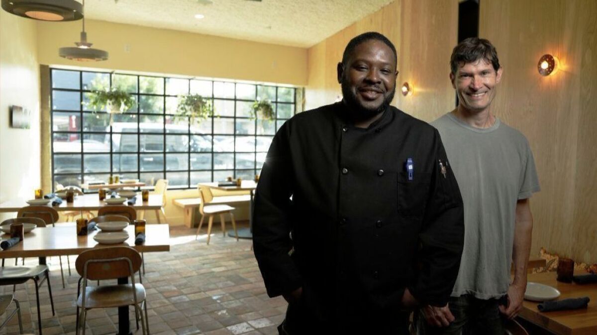 After meeting at Locol in Watts, restaurateur Daniel Patterson, right, and chef Keith Corbin are teaming up again at Alta Adams, the newest restaurant in Patterson’s Alta Group.