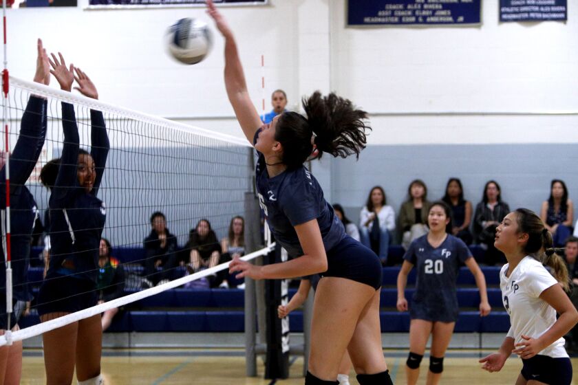 Flintridge Prep girls' volleyball players #16 Jada Gritton goes for the spike in game vs. Chadwick, at home in La Canada Flintridge on Tuesday, Oct. 1, 2019.