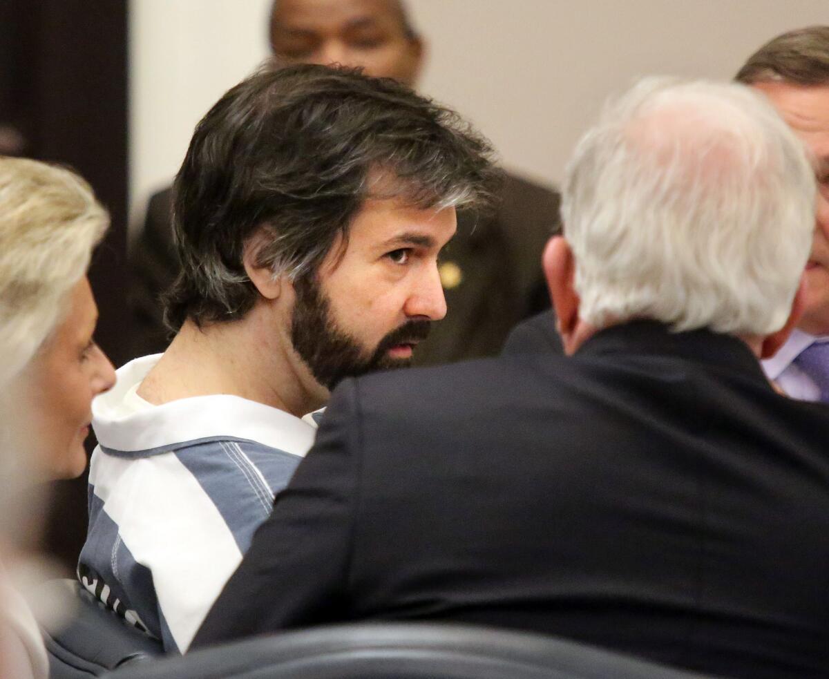 Former North Charleston, S.C., Police Officer Michael Slager talks with his attorney in court.