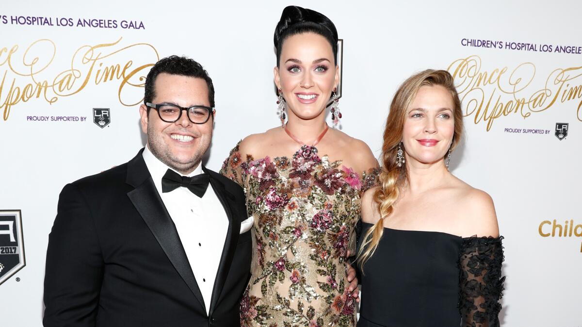 Josh Gad, Katy Perry, center, and gala honoree Drew Barrymore attend the Children's Hospital Los Angeles' "Once Upon a Time" gala at the Event Deck at L.A. Live in downtown Los Angeles on Oct. 15.