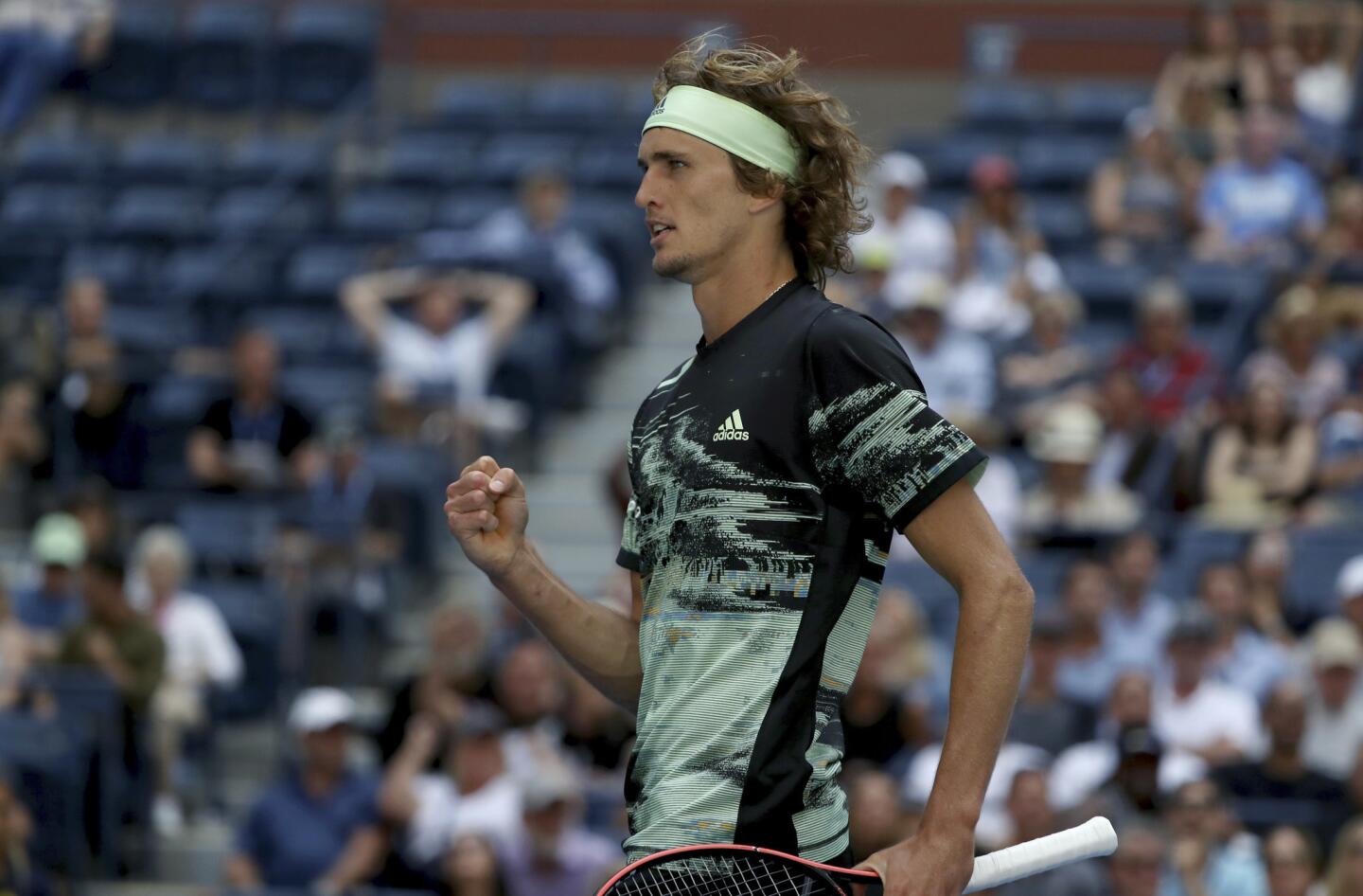 Alexander Zverev reacts after scoring a point against Frances Tiafoe during the second round match on Day 4 of the 2019 U.S. Open at the USTA Billie Jean King National Tennis Center on Aug.29, 2019, in Queens.