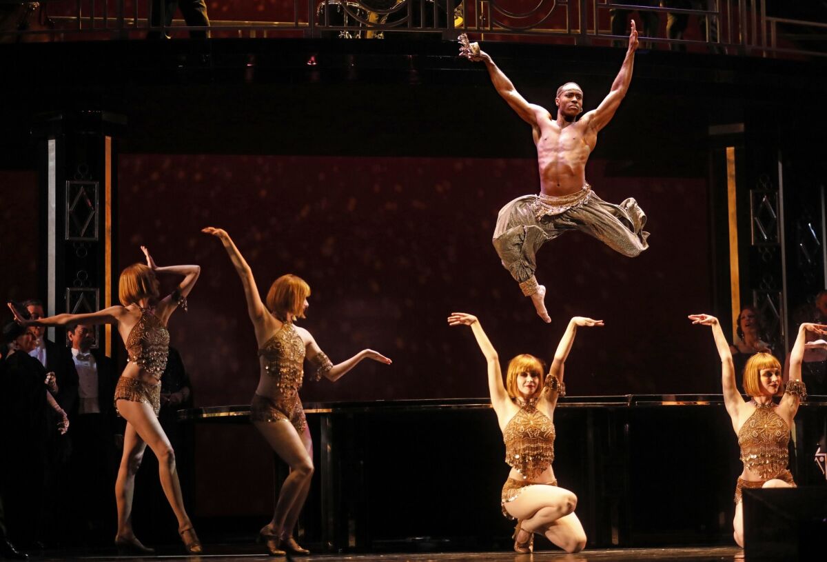 Louis A. Williams Jr. midair in "La Traviata."