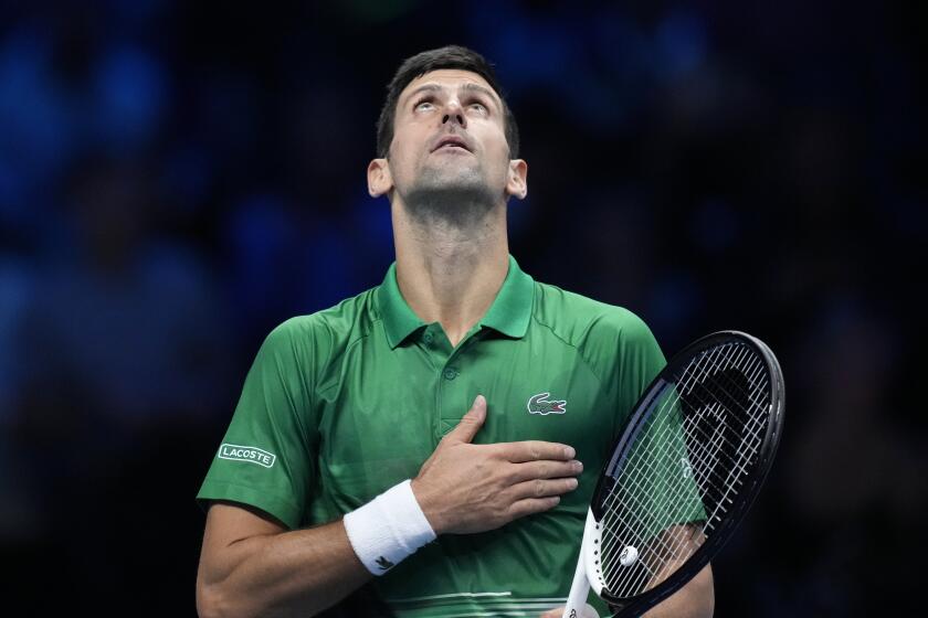 Serbia's Novak Djokovic celebrates after winning against Russia's Andrej Rublev during their singles tennis match of the ATP World Tour Finals, at the Pala Alpitour in Turin, Italy, Wednesday, Nov. 16, 2022. (AP Photo/Antonio Calanni)