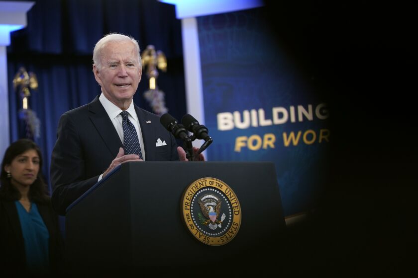 President Joe Biden announces his administration's plans to eliminate junk fees for consumers, Wednesday, Oct. 26, 2022, in the South Court Auditorium on the White House campus in Washington. (AP Photo/Patrick Semansky)