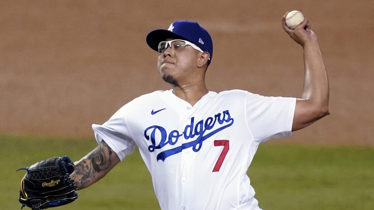 Dodgers relief pitcher Julio Urias throws during Wednesday's win over the Milwaukee Brewers.