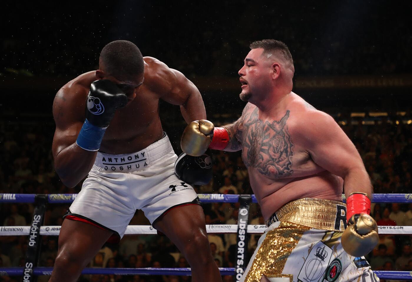 Andy Ruiz Jr punches Anthony Joshua after their IBF/WBA/WBO heavyweight title fight at Madison Square Garden on June 01, 2019 in New York City.