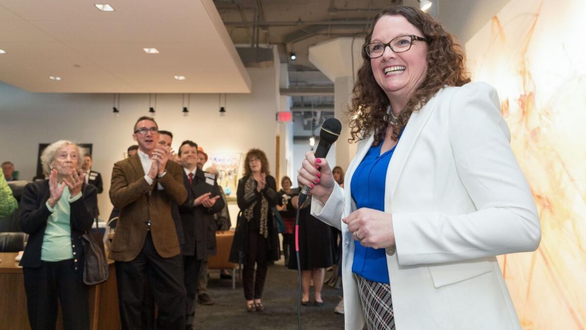 Congressional candidate Kara Eastman speaks at a fundraiser for her campaign at the Omaha Design Center in Omaha on March 14.