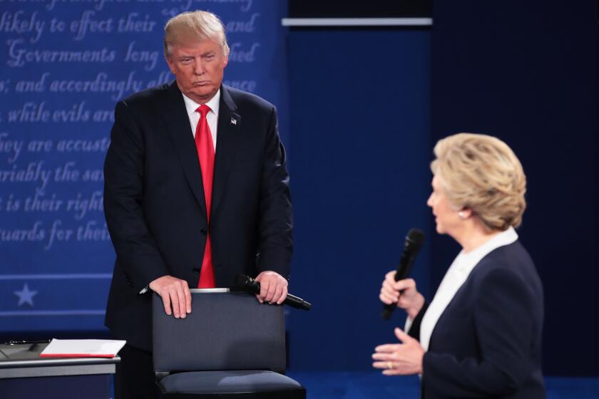 Donald Trump and Hillary Clinton at the second presidential debate in St. Louis, Mo.