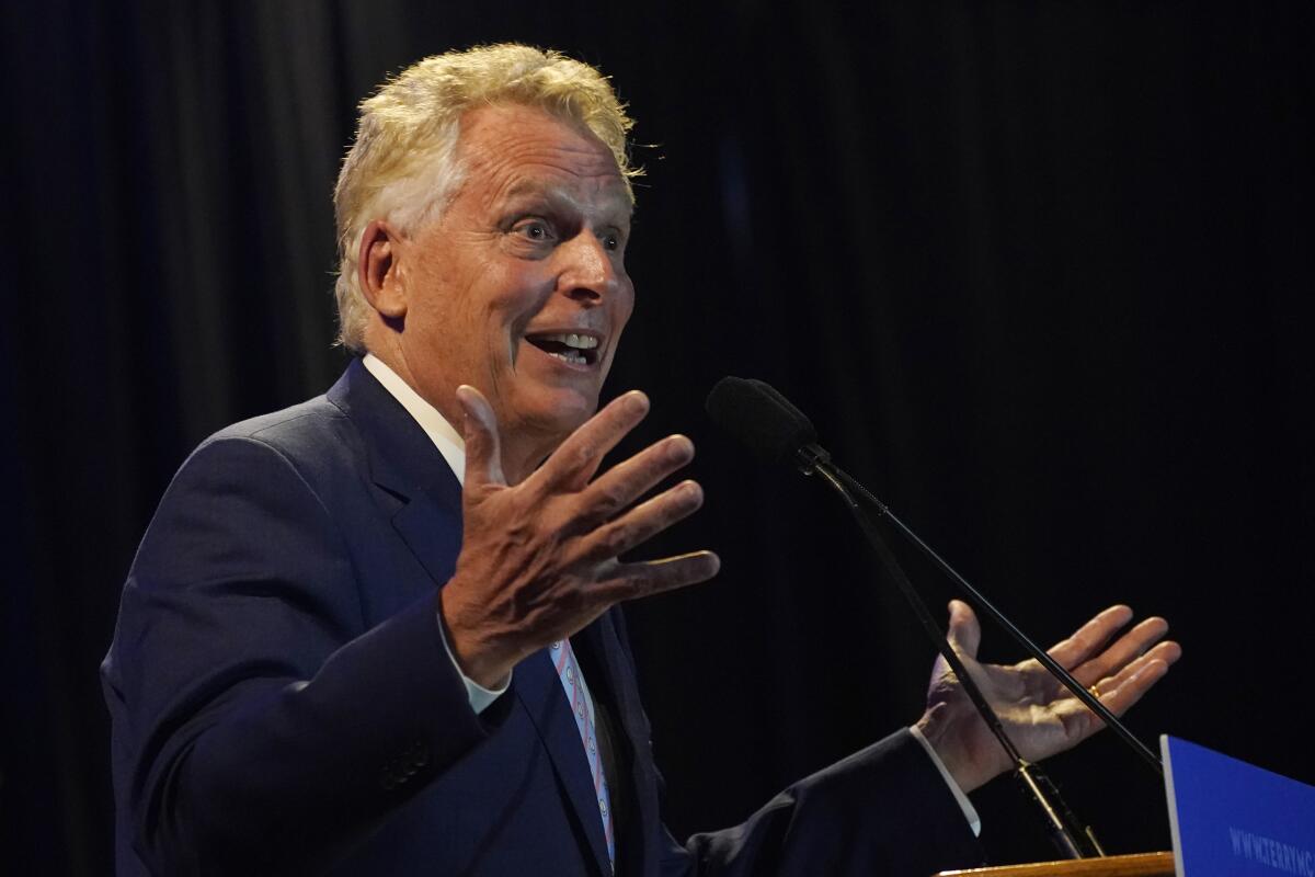 Winner of the Virginia Democratic gubernatorial primary, former Virginia Gov. Terry McAuliffe, gestures as he addresses the crowd during an election party in McLean, Va., Tuesday, June 8, 2021. McAuliffe faced four other Democrats in Tuesday's primary. (AP Photo/Steve Helber)