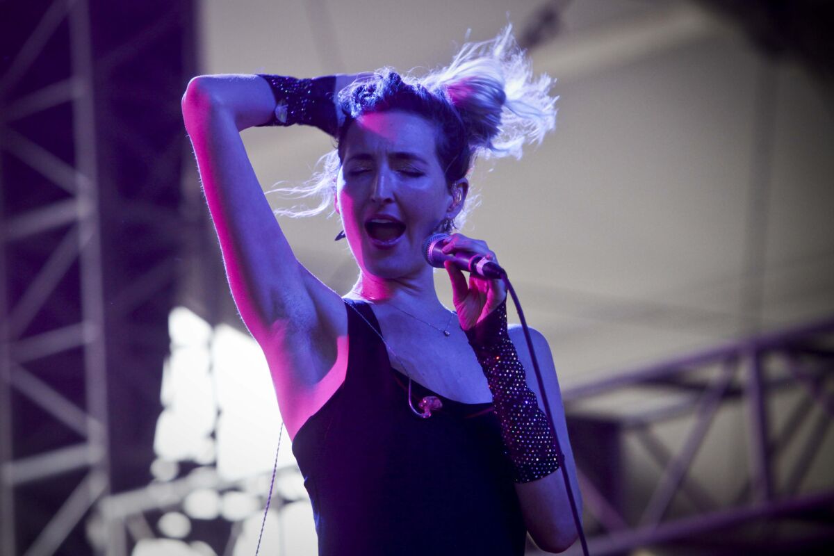 Emily Kokal of Warpaint at the 2014 Coachella Valley Music & Arts Festival. The band will perform at the Music Tastes Good festival in Long Beach.