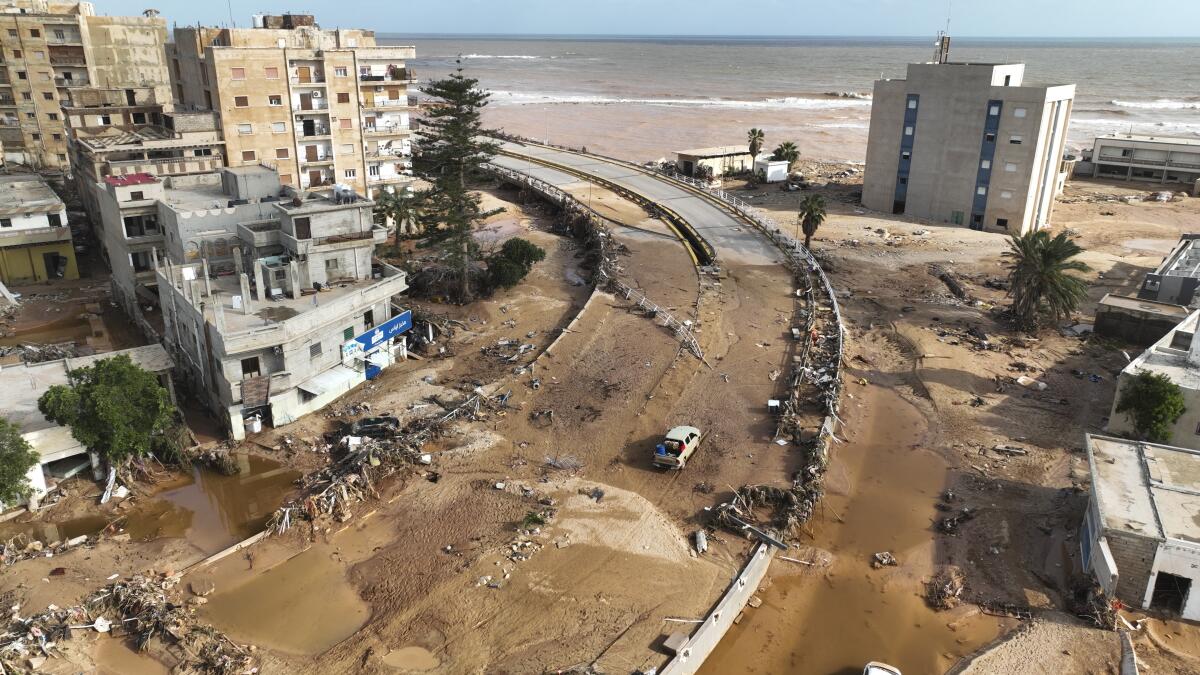 A general view of the city of Derna is seen on Tuesday, Sept. 12, 2023. Mediterranean storm Daniel caused devastating floods in Libya that broke dams and swept away entire neighborhoods in multiple coastal towns, the destruction appeared greatest in Derna city. (AP Photo/Jamal Alkomaty)