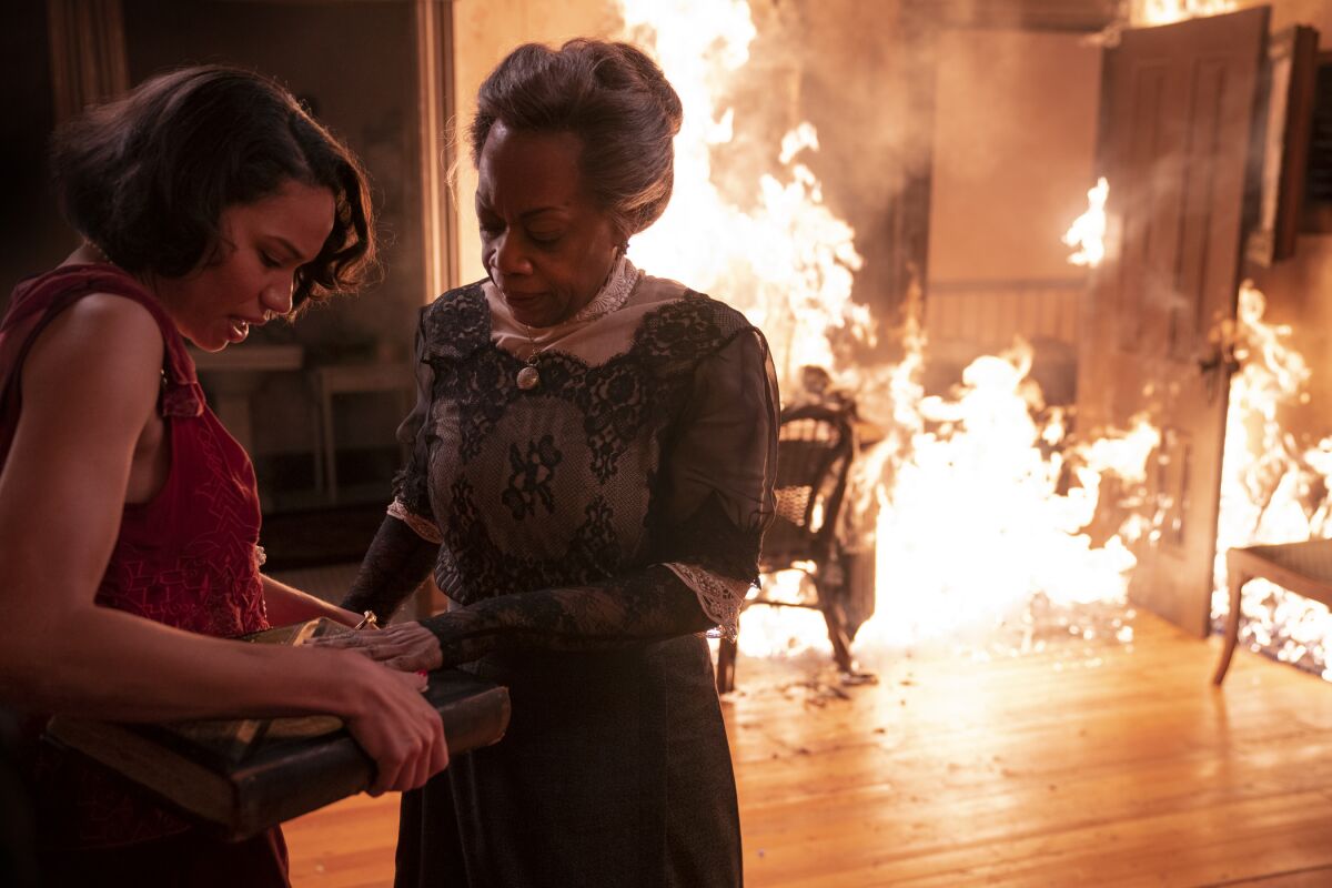 Jurnee Smollett, left, and Regina Taylor in "Lovecraft Country," which travels back in time to the 1921 Tulsa Race Massacre.