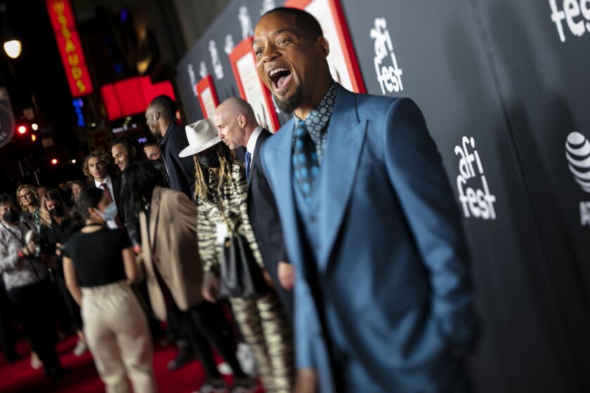 Hollywood, CA - November 14: Will Smith, on the red carpet of the 2021 AFI Fest Gala Premiere of, "King Richard," at the TCL Chinese Theatre, in Hollywood, CA, Sunday, Nov. 14, 2021. The film tells the story of Richard Williams, portrayed by Will Smith, and his raising of daughters Venus and Serena into the tennis champions they have become. (Jay L. Clendenin / Los Angeles Times)