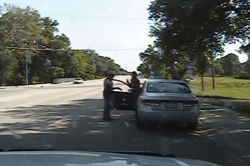 Texas state Trooper Brian T. Encinia arrests Sandra Bland in July.