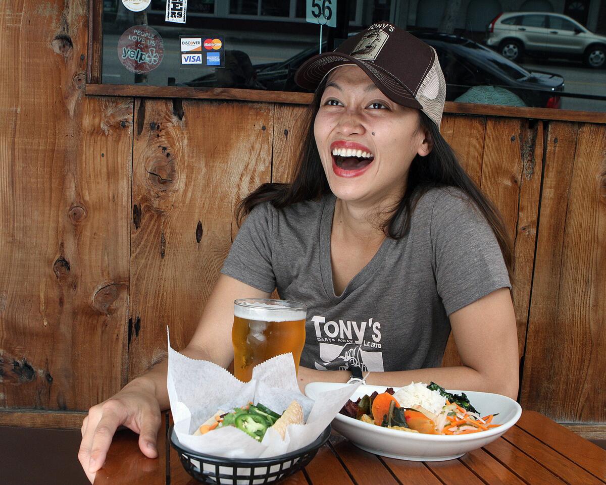 Executive chef Caroline Concha laughs at Tony's Darts Away in Burbank on Thursday, August 6, 2015.
