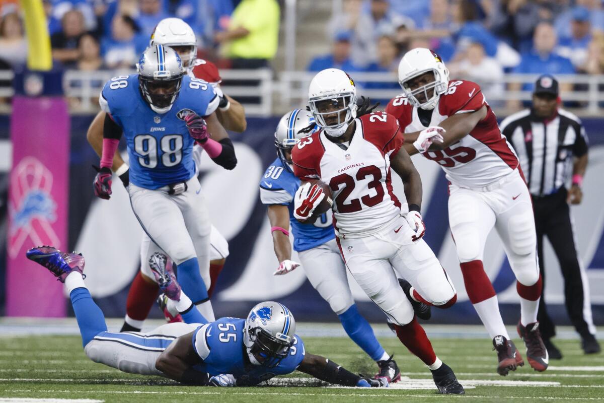 Arizona Cardinals running back Chris Johnson (23) runs against the Detroit Lions during a game on Oct. 11. Johnson has rushed for 405 yards in 79 carries.