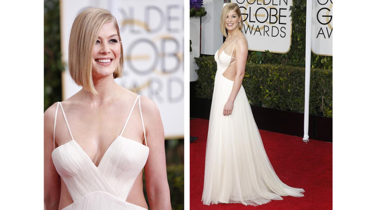 Rosamund Pike wore a revealing white Vera Wang gown to the 72nd Golden Globe Awards on Sunday.