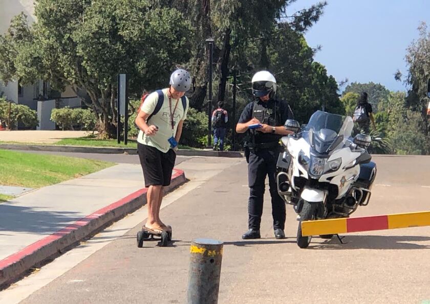 A UC San Diego student is pulled over by a campus police officer in 2019.