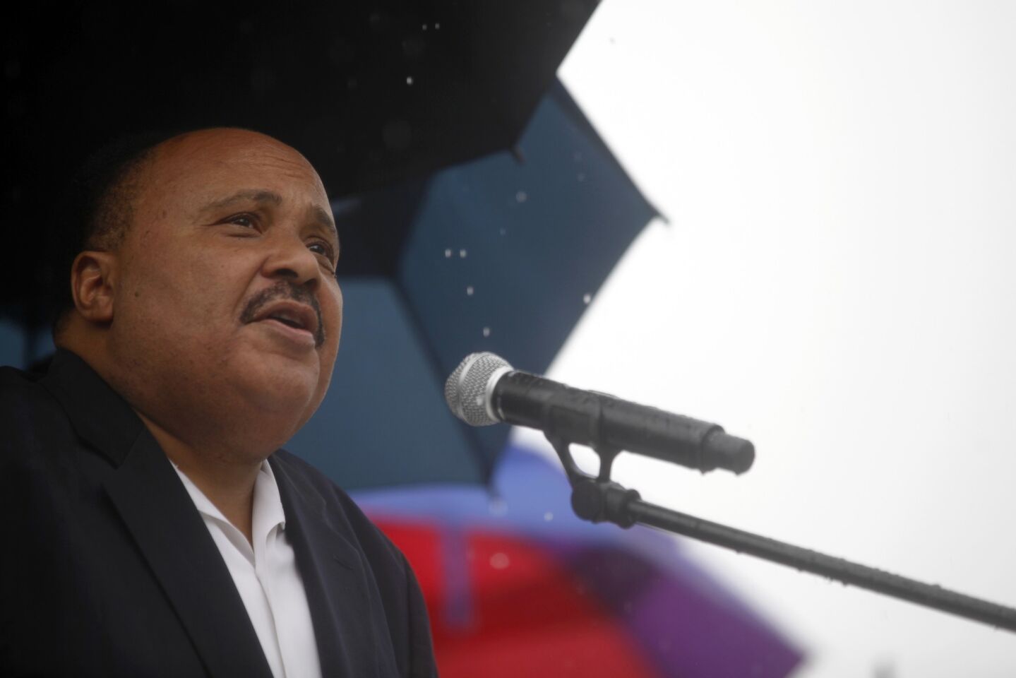 Martin Luther King III speaks at a rally outside the Richard B. Russell Federal Building in Atlanta.