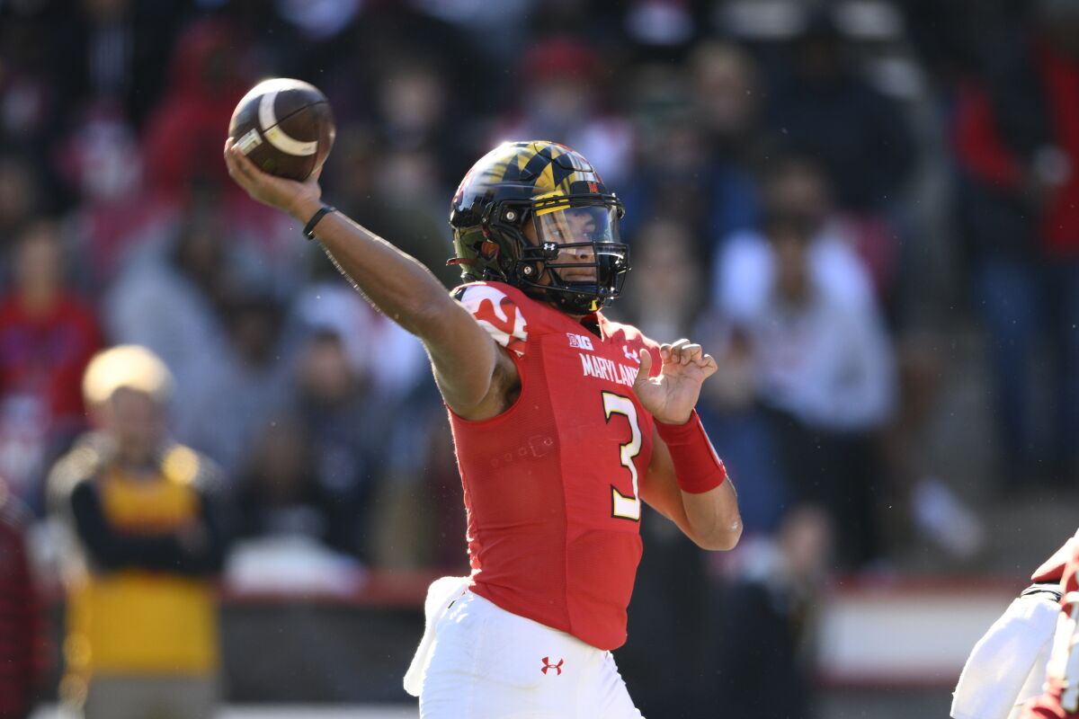 Maryland quarterback Taulia Tagovailoa (3) passes during the first half of an NCAA college football game against Rutgers, Saturday, Nov. 26, 2022, in College Park, Md. (AP Photo/Nick Wass)