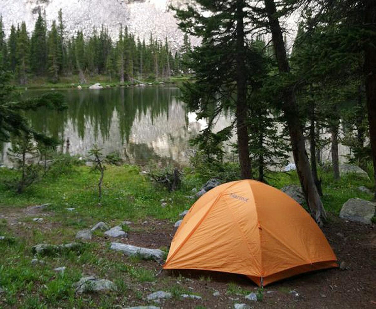 A tent by Lamphier Lake in the Fossil Ridge Wilderness of western Colorado.