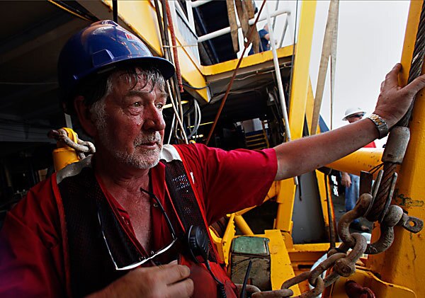 George Ross is part of a team working to burn oil on the surface of the Gulf of Mexico about 7 miles north of the leak.