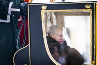 Denmark's Queen Margrethe is escorted by the Hussar Regiment as she rides in a horse-drawn coach from Christian IX's Palace, Amalienborg to Christiansborg Palace in Copenhagen, Denmark, Thursday Jan. 4, 2024. Europe's longest reigning monarch Queen Margrethe rode through Denmark’s capital Thursday in a gilded, horse-drawn coach as she concluded her last New Year celebrations before her abdication later this month. (Emil Nicolai Helms/Ritzau Scanpix via AP)
