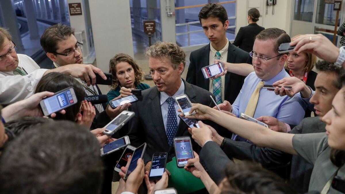 Sen. Rand Paul, R-Ky., speaks to reporters after Republicans released their healthcare bill at the Capitol in Washington on June 22.