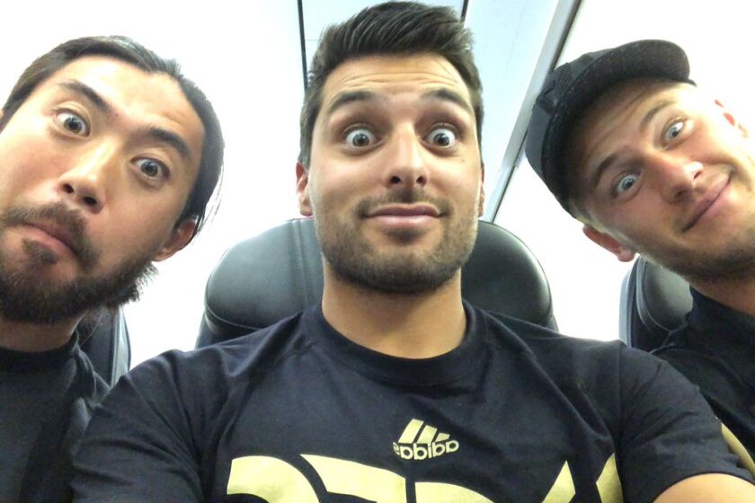 Head performance coach Daniel Guzman, center, is joined by former LAFC players Lee Nguyen, left, and Walker Zimmerman for a Twitter pic.