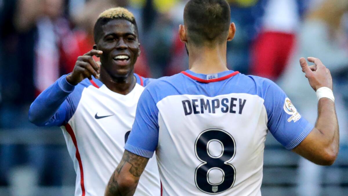 U.S. forwards Gyasi Zardes and Clint Dempsey celebrate after a goal against Ecuador in a Copa American game in June.