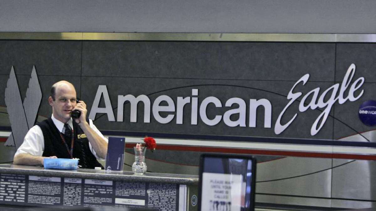 The 1,800 flight attendants for American Eagle oppose the proposed merger of American Airlines and US Airways, fearing their jobs are at risk because of a series of outsourcing plans announced since November.