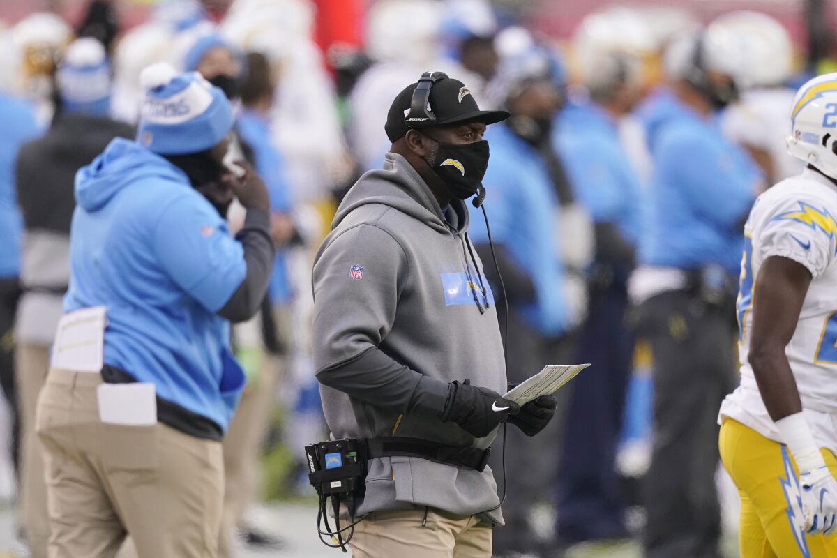 Chargers coach Anthony Lynn watches from the sideline.
