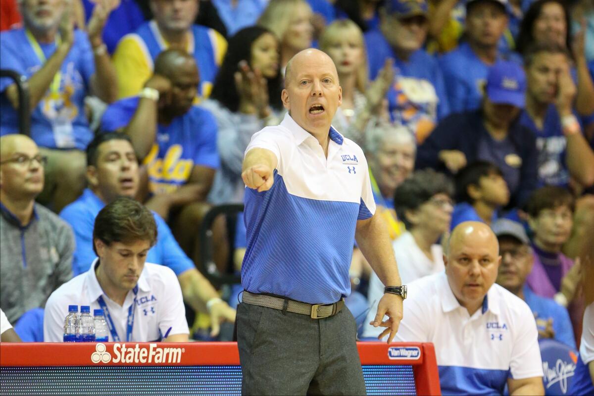 UCLA coach Mick Cronin directs his players during the first half of a game against Brigham Young on Nov. 25 at the Maui Invitational.