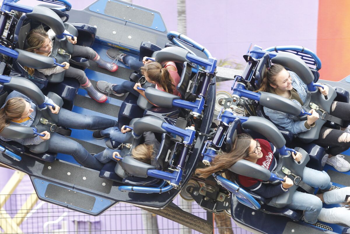 Riders brave the new Sea World ride called Tidal Twister on May 21, 2019.