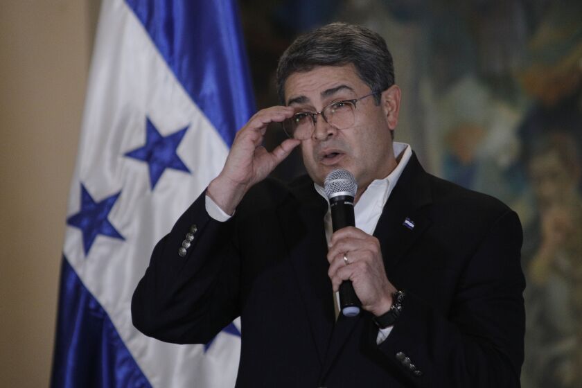 FILE - Honduran President Juan Orlando Hernandez speaks during a press conference at the Presidential House in Tegucigalpa, Honduras, March 24, 2021. A court in Honduras authorized prosecutors Friday, April 1, 2022, to seize properties, bank accounts and vehicles linked to Hernandez. (AP Photo/Elmer Martinez, File)