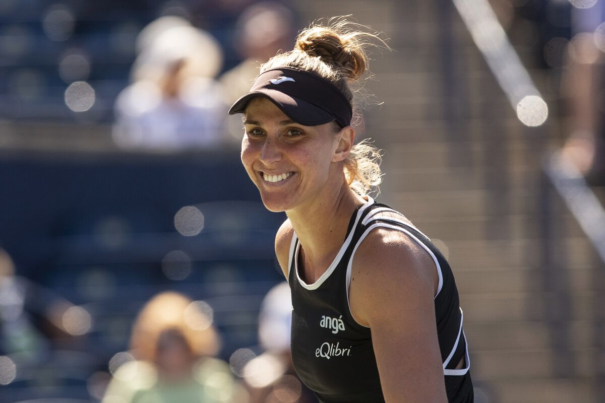 Beatriz Haddad Maia, of Brazil, smiles during her win over Iga Swiatek, of Poland, during the National Bank Open tennis tournament Thursday, Aug. 11, 2022, in Toronto. (Chris Young/The Canadian Press via AP)
