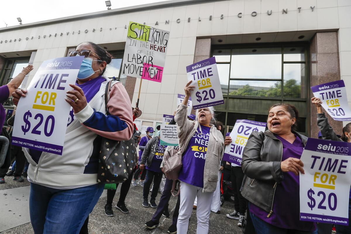 In-home care workers urge the L.A. County Board of Supervisors to increase their pay on Nov. 1. 