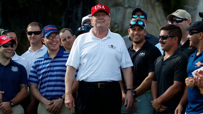 President Trump meets with members of the U.S. Coast Guard at Trump International Golf Club in West Palm Beach, Fla. on Dec. 29.