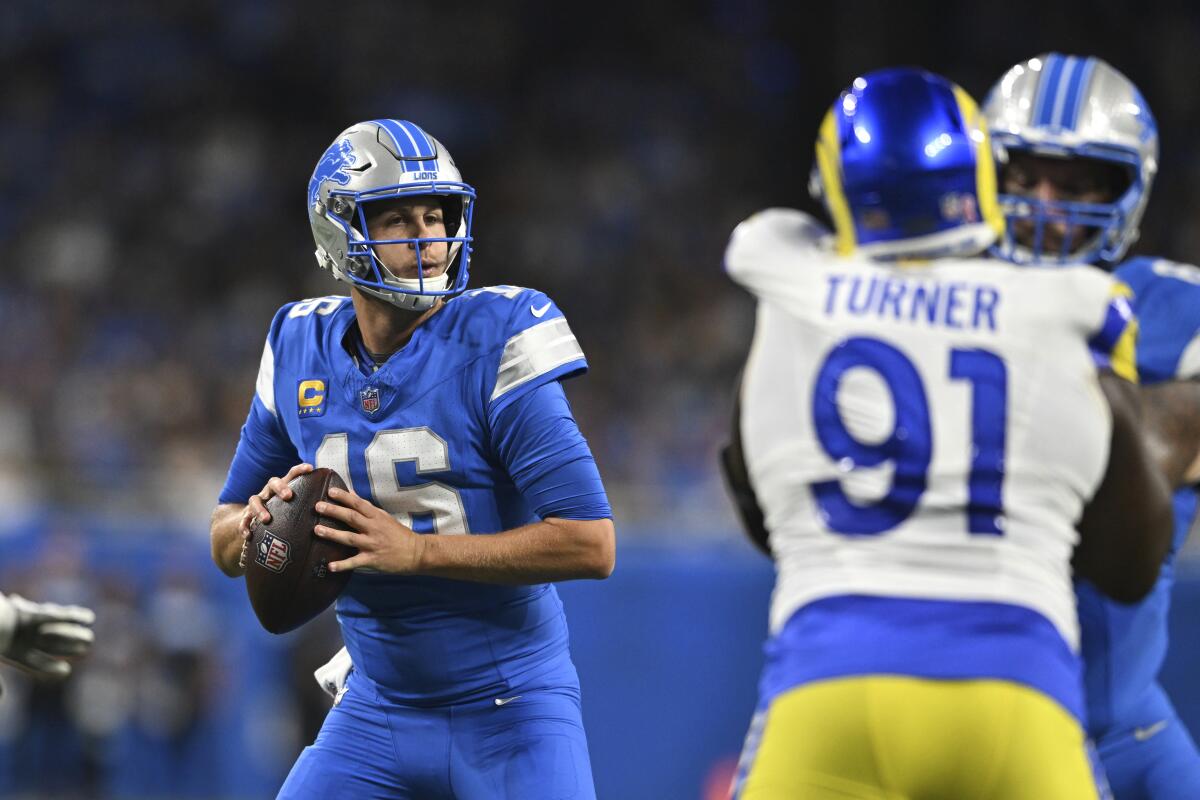 Detroit Lions quarterback Jared Goff looks to pass against the Rams in the first half Sunday.