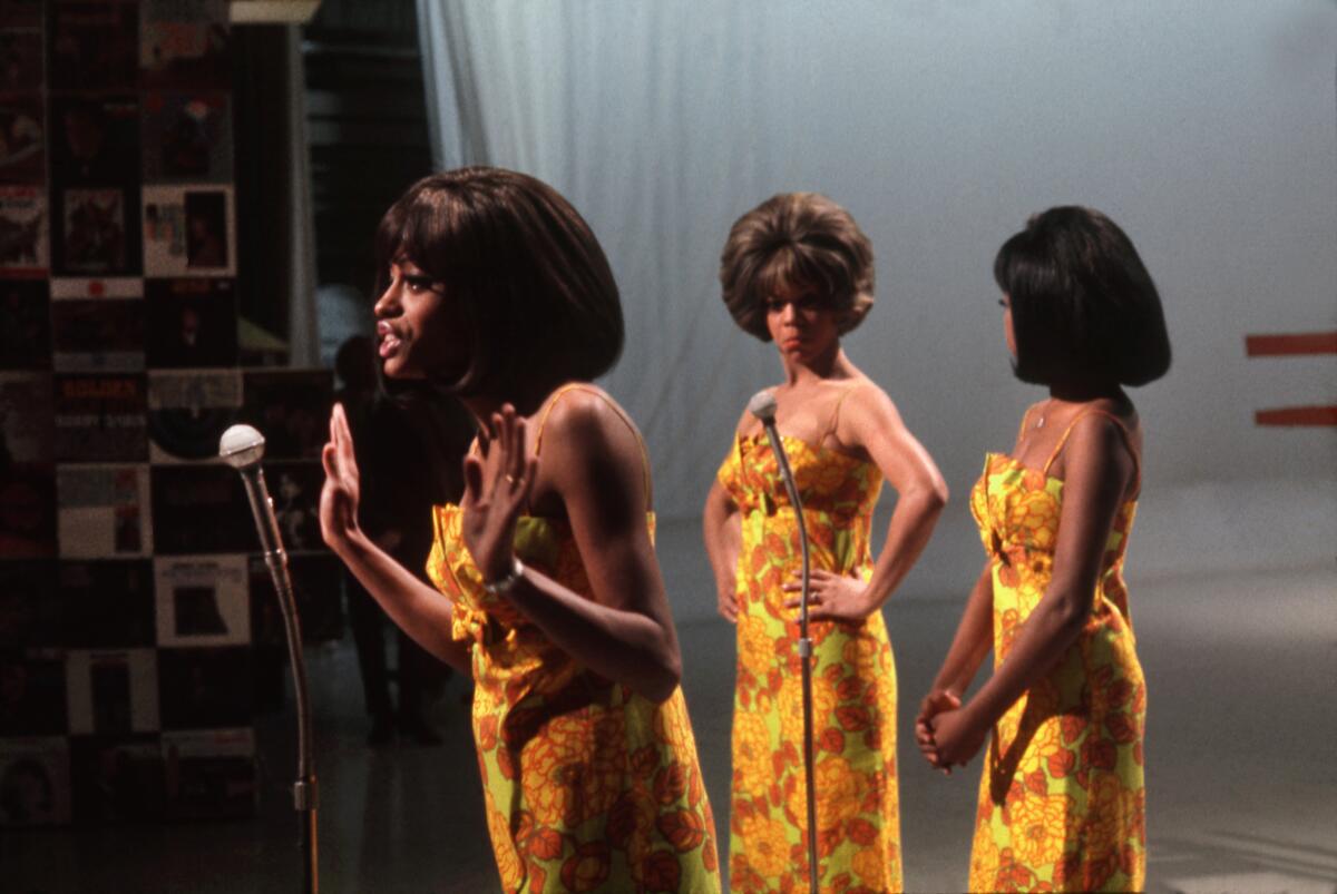 Diana Ross, left, is shown with Mary Wilson, center, and Florence Ballard of The Supremes