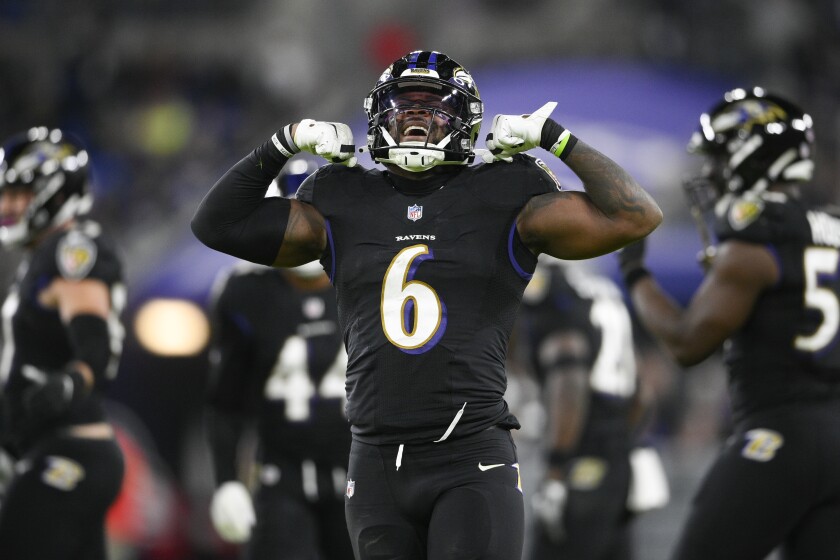 Baltimore Ravens inside linebacker Patrick Queen reacts after making a tackle on Cleveland Browns running back Kareem Hunt during the second half of an NFL football game, Sunday, Nov. 28, 2021, in Baltimore. (AP Photo/Nick Wass)