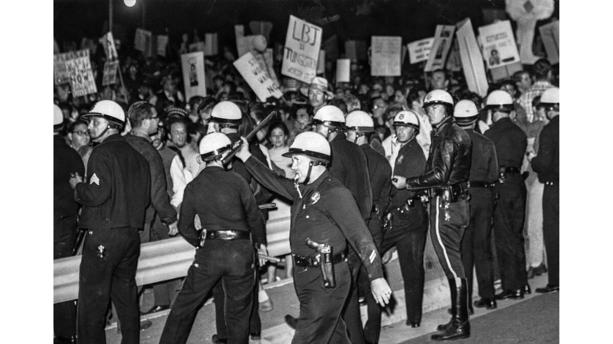 June 23, 1967: Antiwar protesters and police outside Century Plaza Hotel.