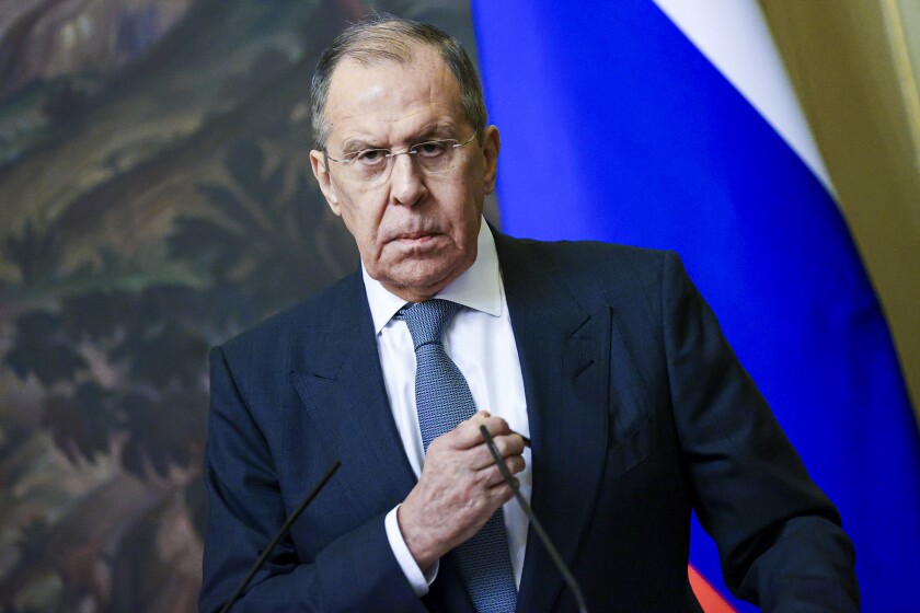 In this photo released by the Russian Foreign Ministry Press Service, Russian Foreign Minister Sergey Lavrov pauses during his and Brazilian Foreign Minister Carlos Franca's joint news conference following their talks in Moscow, Russia, Tuesday, Nov. 30, 2021. (Russian Foreign Ministry Press Service via AP)
